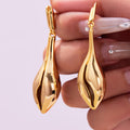 Sculptural Open Shell Drop Earrings in Gold and Silver Tone view 4