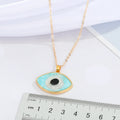 Gold Tone Light Blue Evil Eye Pendant Necklace with Round Frame view 3