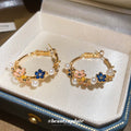 Multicolor Floral Hoop Earrings With Gold Tone Details view 1