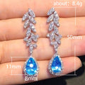 Blue Teardrop and Leaf Cluster Long Drop Earrings in Silver Tone view 4