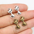 Sitting Cat Metal Charms with Cutout Details in Two Finishes view 1