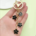 Gold-Tone Initial Letter Keychain With Three Flower Charms view 4
