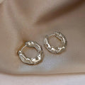 Textured Small Hoop Earrings in Silver and Gold Tones view 2