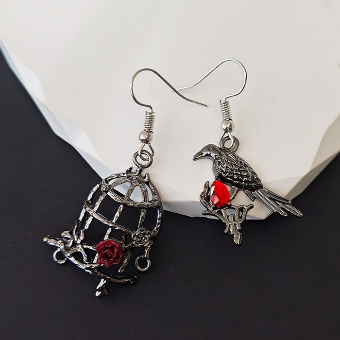 Asymmetrical Raven and Rose Birdcage Drop Earrings in Blackened Metal
