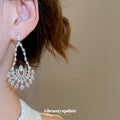 Silver Openwork Crystal Teardrop Stud Earrings with Polished Metal Details view 3