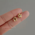 Gold Tone Open Five Petal Flower Clear Stone Stud Earrings view 4
