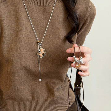 Wood Horse Pearl Tassel Cord Necklace with Distinctive Textured Details