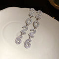 Crystal Numeral Statement Drop Earrings in Silver Tone view 6