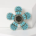 Southwestern Flower Brooch With Polished Metal And Sculpted Decorative Details view 4