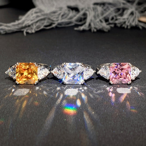 Front view showing pink, clear, and golden oval center options with clear halos
