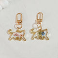 Gold Tone Pressed Flower Cat Resin Clip Keychains in Eight Designs view 4