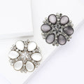 Crystal Framed Cat Eye Cabochon Flower Brooch in Gray and White view 1