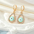 Gold Tone Crystal Teardrop Evil Eye Necklace and Earring Options view 7