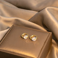 Gold Huggie Hoop with Clear Look Teardrop Earrings view 3