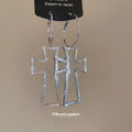 Open Cross Hoop Earrings in Gold and Silver with Polished Metal Details view 4
