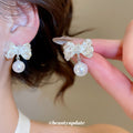 Bow Stud Earrings with Pearl Drops in Black and Silver Tones view 4