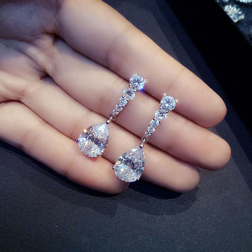 Front view showing graduated clear stones ending in teardrop drops