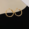 Metal Hoop Earrings in Gold and Silver with Varied Textures view 8
