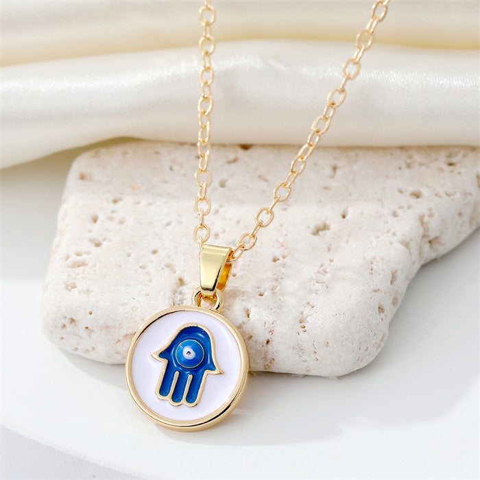 Gold Tone Hamsa and Heart Evil Eye Pendant Necklaces in Three Designs