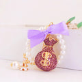 Rhinestone Money Bag Keychain With Bow, Pearl Strand And Eiffel Tower Charm view 8
