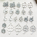 Antique Silver Four-Leaf Clover Metal Charms with 12 Listed Options view 1