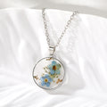 Round Pressed Blue Flower Resin Necklace and Earring Options view 6