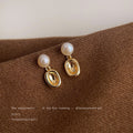 Gold Pearl Stud Earrings Hollow Oval Metal Drop Charm view 3