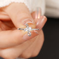 Silver Tone Bow Ring With Clear Floral Stone Center view 3