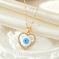 Gold Tone Crystal Open Heart Realistic Eye Pendant Necklaces view 5