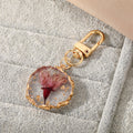 Gold Tone Irregular Round Pressed Flower Resin Clip Keychains view 3