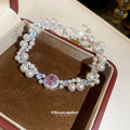 White Pearl Multi Strand Bracelet with Pink Center Stone view 4