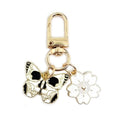 Gold Tone Butterfly Skull and Cherry Blossom Clip Keychains view 12