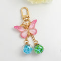 Pink Ombre Glitter Butterfly Keychain With Two Star Confetti Globes view 3