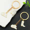 White Western Hat and Boot Star Metal Keychain Set view 1