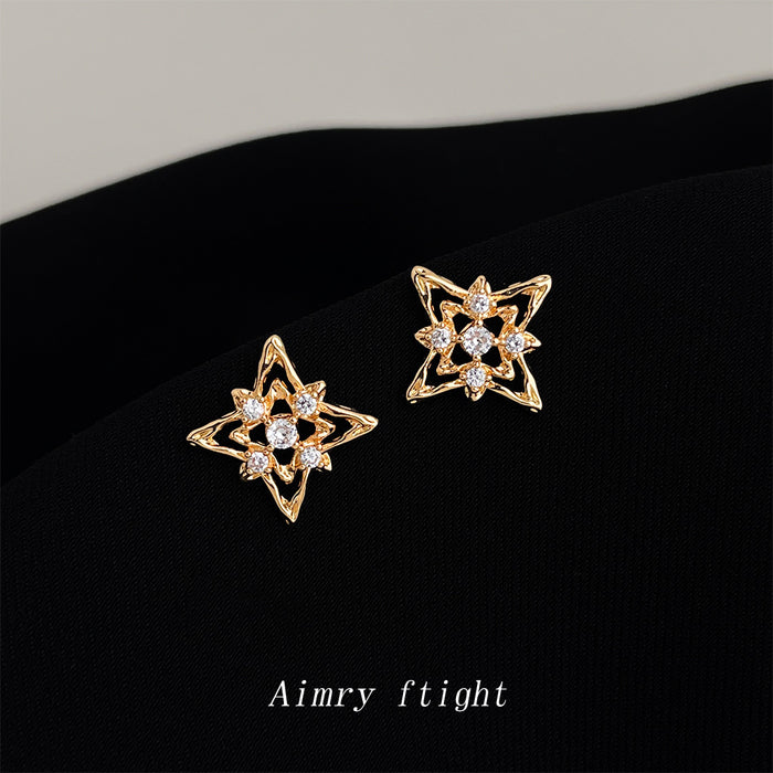 Gold Openwork Starburst Cubic Zirconia Stud Earrings