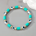 Gold Tone Evil Eye and Polymer Clay Bead Stretch Bracelets view 2