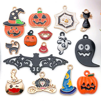 Colorful pumpkin charms arranged on a light background