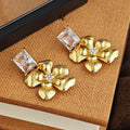 Clear Rectangular Crystal and Flower Drop Earrings in Gold Tone view 3