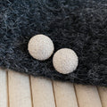 Textured Round Stud Earrings With Polished Metal Tone Details view 2