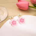 Pink Acrylic Cherry Blossom Drop Earrings Gold Bow Tops view 4