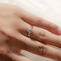 Round Clear Solitaire Twisted Ribbon Ring In Silver Tone view 3