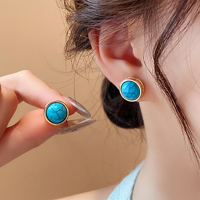 Turquoise Blue Oval Stone Look Stud Earrings With Decorative Metal Details