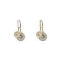 Gold Tone Blue Center Disc And Clear Flower Charm Huggie Earrings view 5