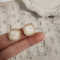 Gold Tone Square Frame Crushed White Shell Stud Earrings view 3