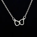 Interlocking Open Heart Pendant Necklace Gold Silver view 1