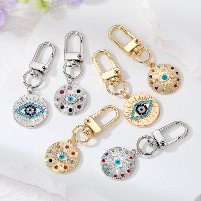 Gold and Silver Tone Crystal Round Evil Eye Clip Keychains in Six Designs