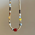 Mixed Bead Choker Necklace Red Accent Stone Yellow Spots view 2