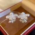 Translucent Flower Clip-On Earrings in Silver and Gold view 2