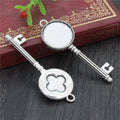 Key Shaped Round Cabochon Pendant Bases in Bronze and Silver view 2