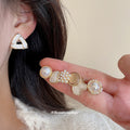 Gold Pearl Cat Eye Sixteen Piece Mixed Stud Earring Set view 2